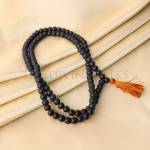 Wearing karungali Mala