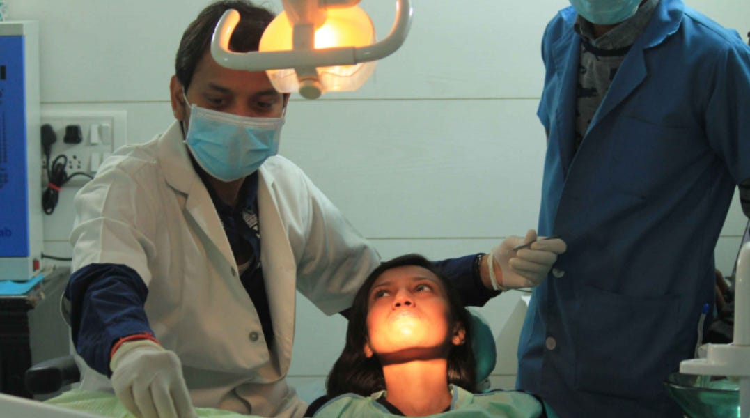 Laser teeth whitening services Noida sec 12